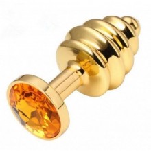 Металлическая пробка с ребрышками и оранжевым кристаллом от компании Джага-Джага, цвет золотой, 512-10 ORANGE-DD, коллекция Anal Jewelry Plug, длина 7 см.