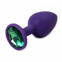 Пробка для попы со стразом, фиолетовая с зеленым, Luxurious Tail 47156, цвет фиолетовый, длина 7.1 см.